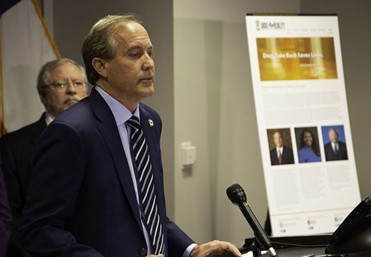 Attorney General Paxton at a podium