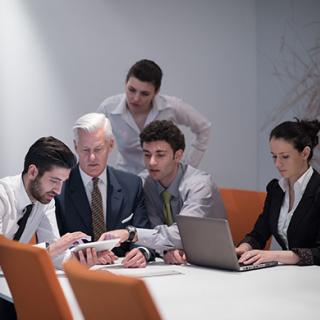 Lawyers and legal assistants putting a case together